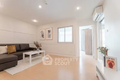 Spacious modern living room with elegant decor and natural light