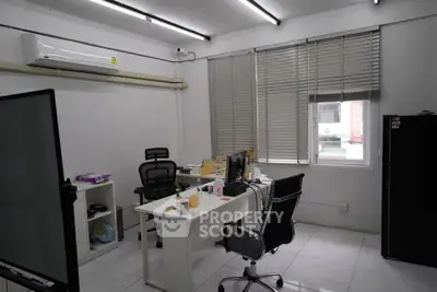 Modern office space with sleek furniture and ample natural light