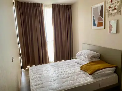 Cozy bedroom with modern decor and natural light