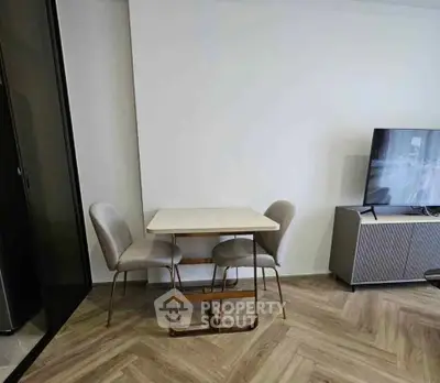 Modern living room with stylish furniture and sleek TV setup