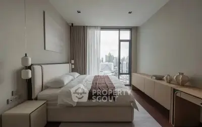 Luxurious bedroom with city view, elegant decor, and natural light.