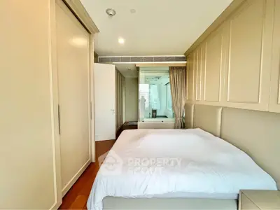 Modern bedroom with sleek design and ample natural light