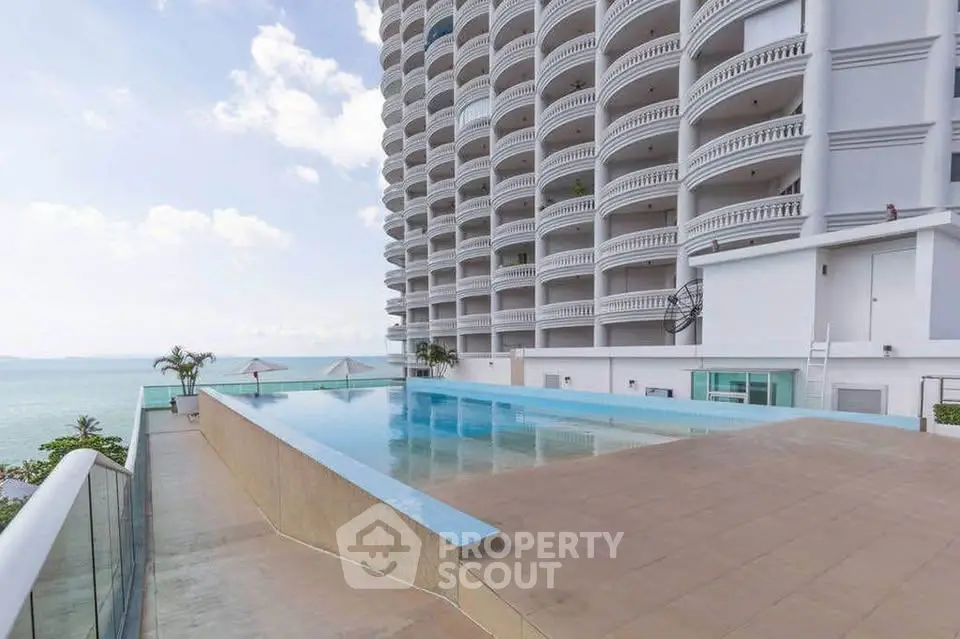 Luxurious beachfront condominium with infinity pool and stunning ocean views.