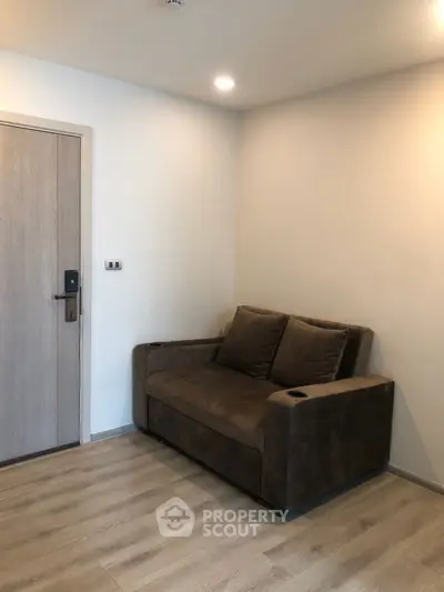 Cozy corner with a plush brown sofa in a modern apartment