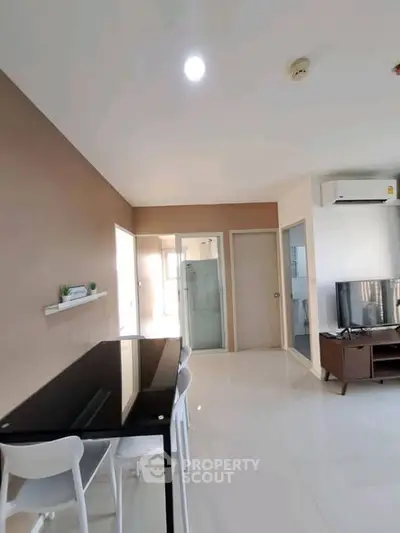 Modern living room with sleek furniture and natural light