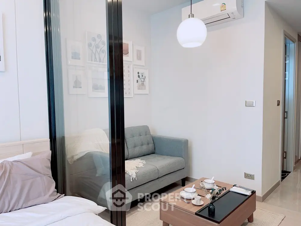 Modern studio apartment with cozy living area and stylish decor