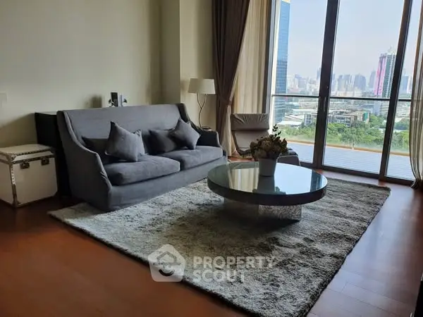 Spacious living room with modern sofa and city view balcony in luxury apartment
