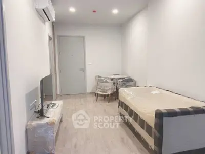 Modern minimalist living room with sleek furniture and neutral tones