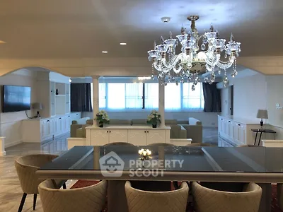 Luxurious living room with elegant chandelier and spacious seating area