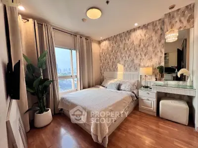 Elegant bedroom with city view, stylish decor, and ample natural light in modern apartment.