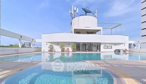 Luxurious rooftop pool with stunning city views and modern amenities.