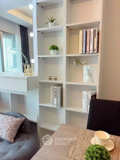 Modern living room with stylish bookshelf and cozy decor