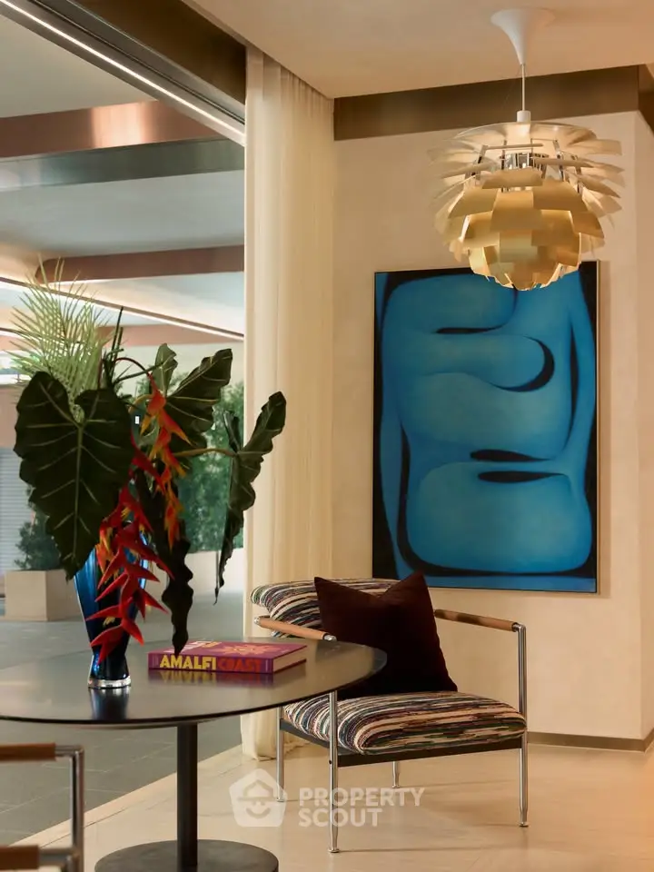 Stylish modern living room with unique art and designer lighting