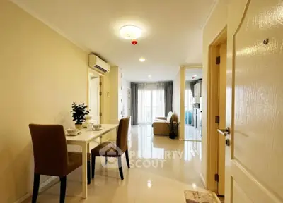 Spacious modern apartment with open layout and elegant dining area.