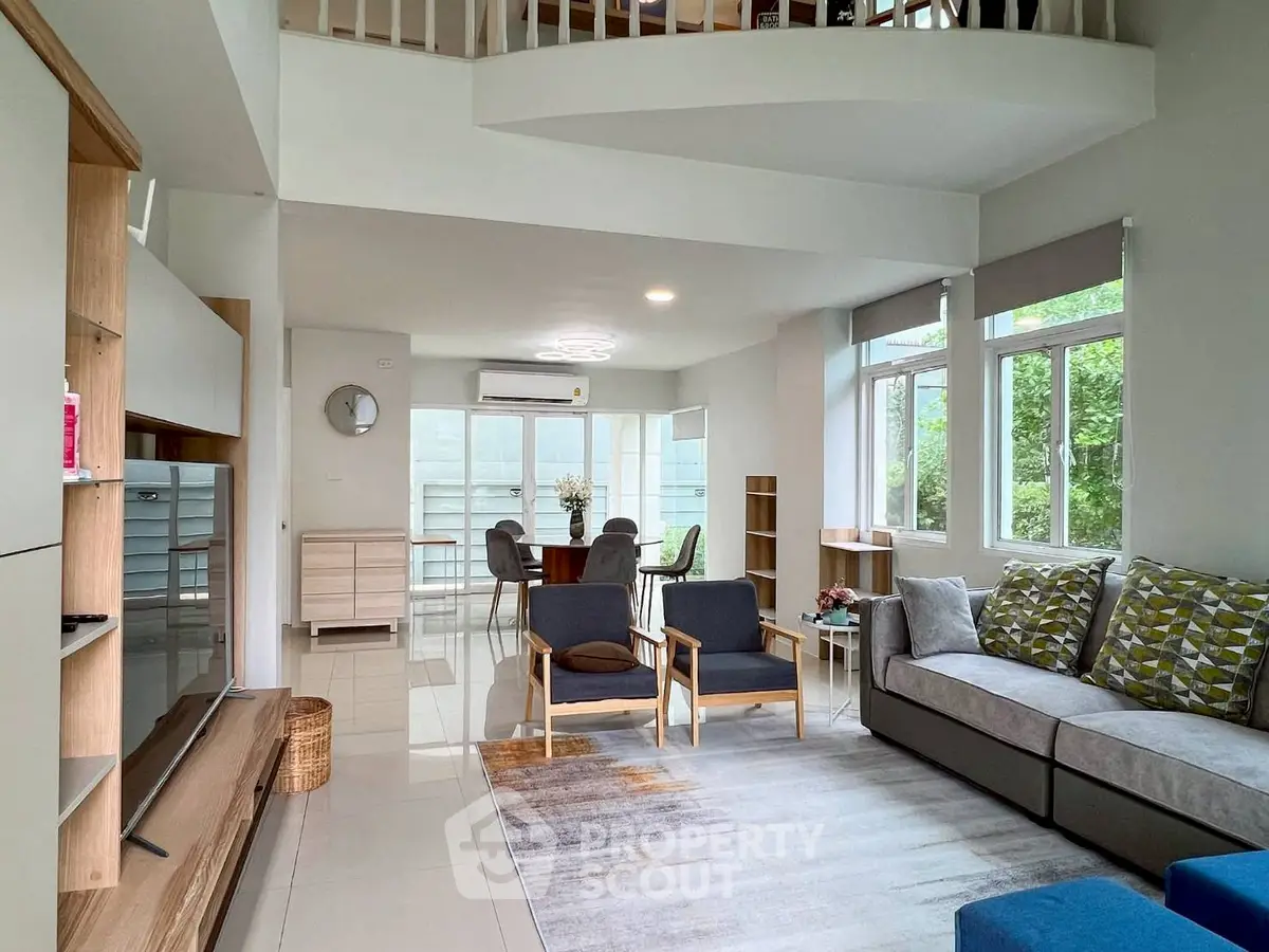 Spacious modern living room with open layout and natural light