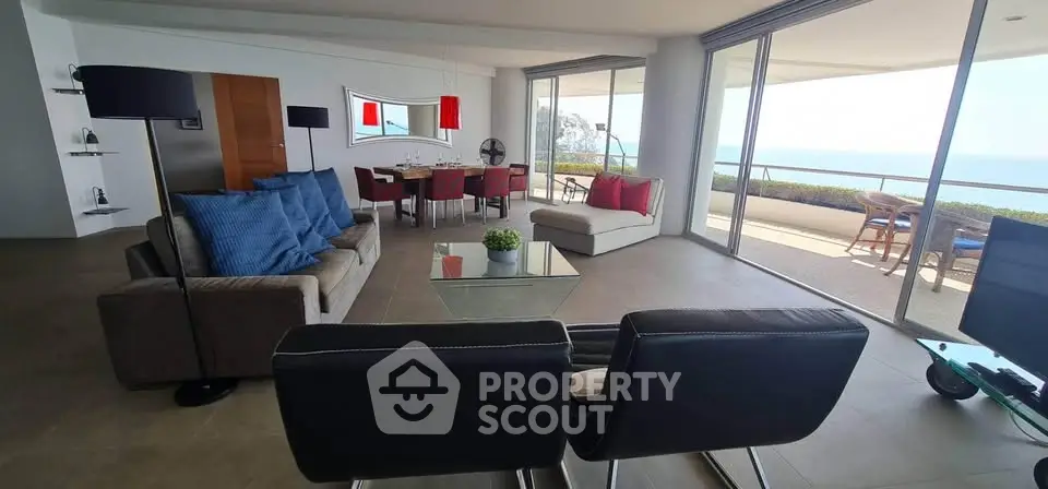 Spacious modern living room with ocean view and elegant decor