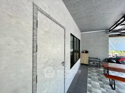 Modern outdoor patio with sleek design and tiled flooring