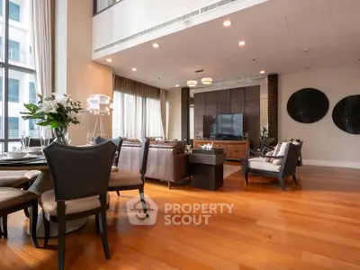 Luxurious living room with elegant decor and large windows in modern apartment