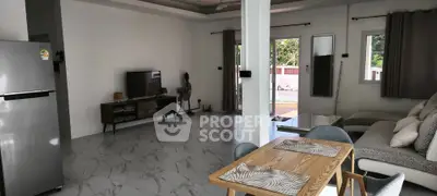 Spacious modern living room with open layout and stylish furniture