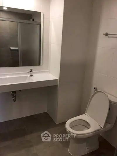 Modern bathroom with sleek fixtures and spacious layout