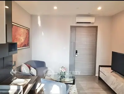 Modern living room with stylish decor and air conditioning