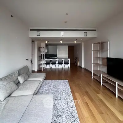 Spacious modern living room with sleek furniture and open layout