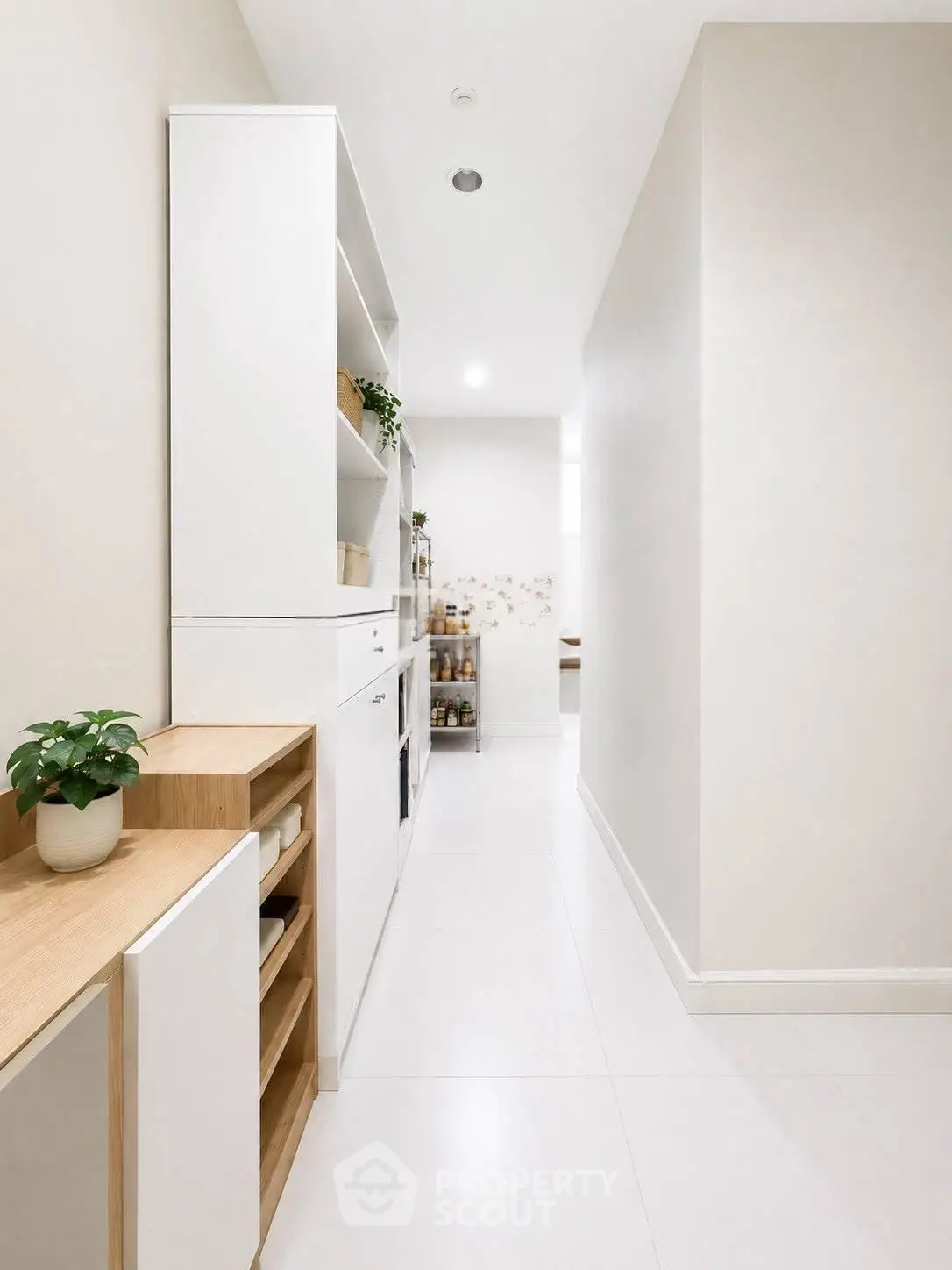 Sleek modern hallway with minimalist design and built-in storage solutions.