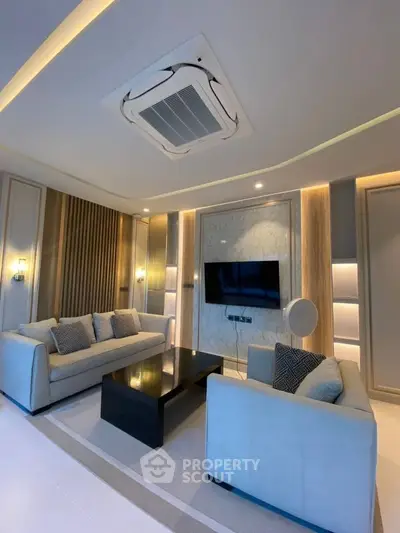Luxurious modern living room with elegant sofas and stylish lighting