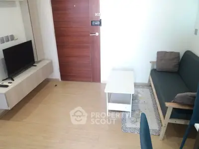 Cozy modern living room with wooden flooring and minimalist furniture