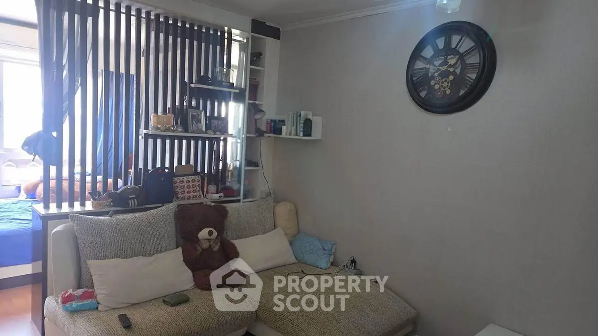 Cozy living room with modern decor and plush seating, perfect for relaxation.