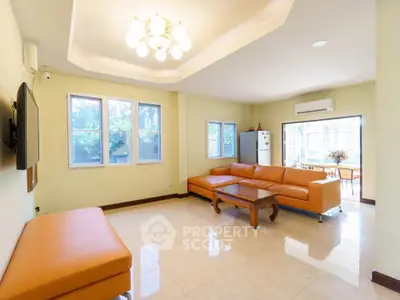 Spacious living room with modern furniture and natural light