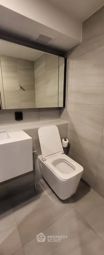 Modern bathroom with sleek design and contemporary fixtures.