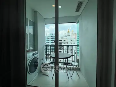 Modern balcony with washing machine and city view, perfect for urban living.