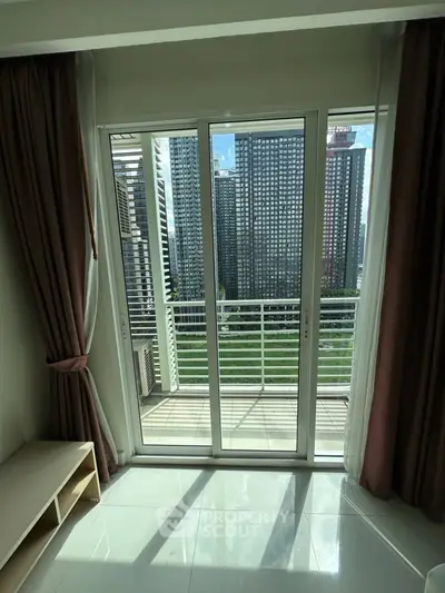 Modern apartment with balcony offering stunning cityscape views