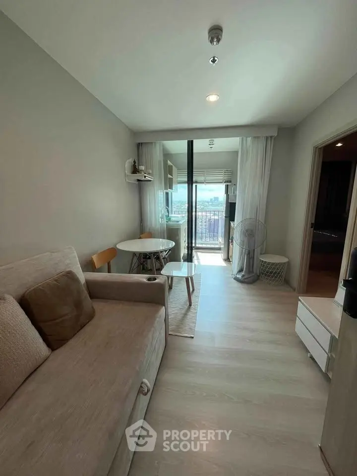 Modern living room with balcony view in stylish apartment