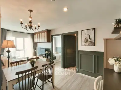 Charming open-plan living and dining area with elegant decor and natural light.