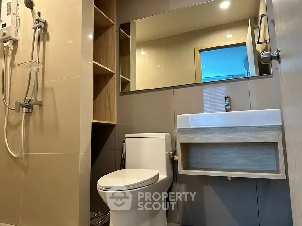 Modern bathroom with sleek fixtures and ample storage space