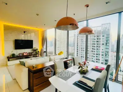 Luxurious modern living room with stunning city view and elegant decor