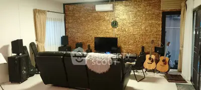 Cozy living room with musical instruments and modern entertainment setup