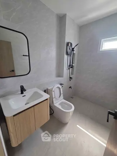 Modern bathroom with sleek fixtures and natural light