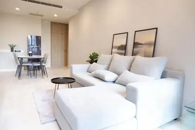 Spacious modern living room with cozy sofa and elegant decor