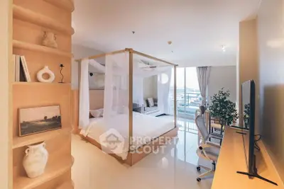 Luxurious bedroom with canopy bed and balcony view in modern apartment