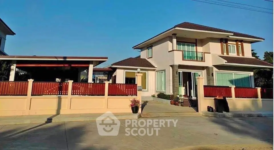 Stunning two-story house with modern design and spacious driveway in a serene neighborhood.