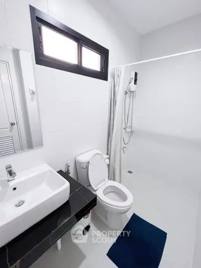 Modern bathroom with sleek fixtures and minimalist design