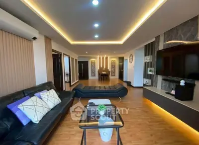 Luxurious modern living room with elegant lighting and stylish decor