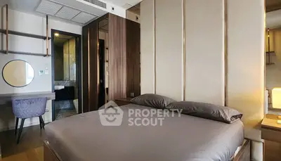 Luxurious modern bedroom with elegant furnishings and ensuite bathroom