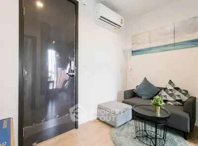 Cozy living room with modern decor and air conditioning