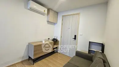 Modern living room with air conditioning and stylish furniture