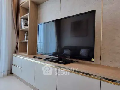 Modern living room with sleek TV unit and elegant decor