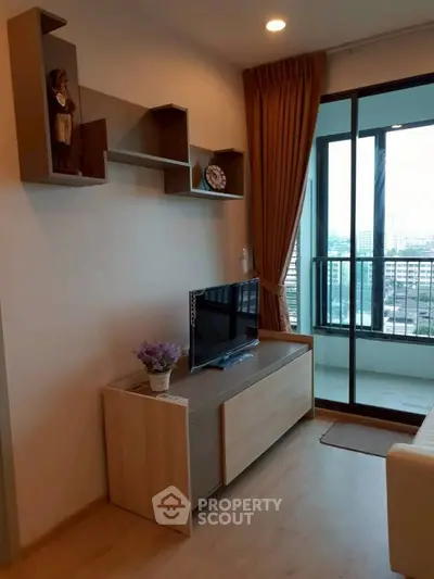Modern living room with balcony view in urban apartment